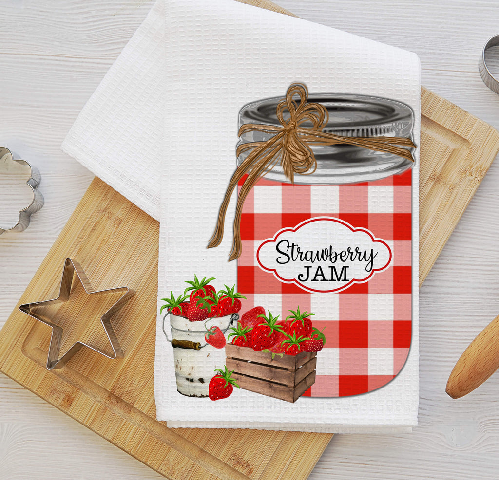 Farmhouse kitchen towel set featuring rustic mason jars with strawberry jam and homemade sweet pickles, designed with vintage gingham patterns. Absorbent waffle weave fabric, perfect for country kitchens, homesteaders, and farmhouse decor lovers