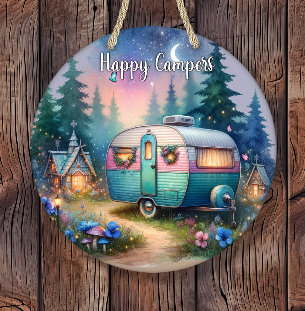Whimsical hanging round sign featuring a retro teal and pink camper with wreaths on the doors, parked on a glowing forest path under a twilight sky with stars, crescent moon, fireflies, and woodland fairy houses lit warmly in the background - Personalized Kreation