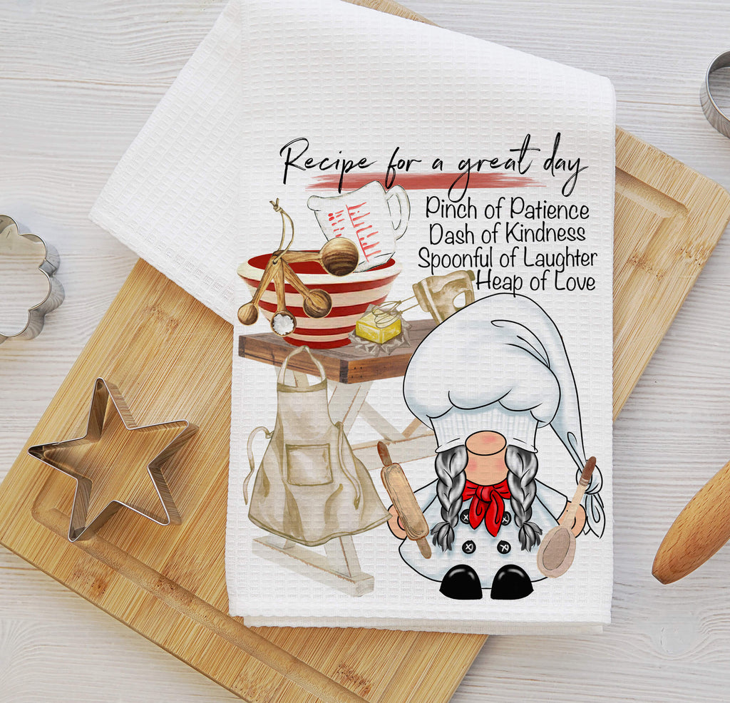 Adorable Recipe Gnome Kitchen Towel featuring a whimsical chef gnome, farmhouse baking setup, and a heartwarming 'Recipe for a Great Day' design. Perfect for baking lovers, farmhouse kitchen decor, and unique cooking gifts - Personalized Kreation