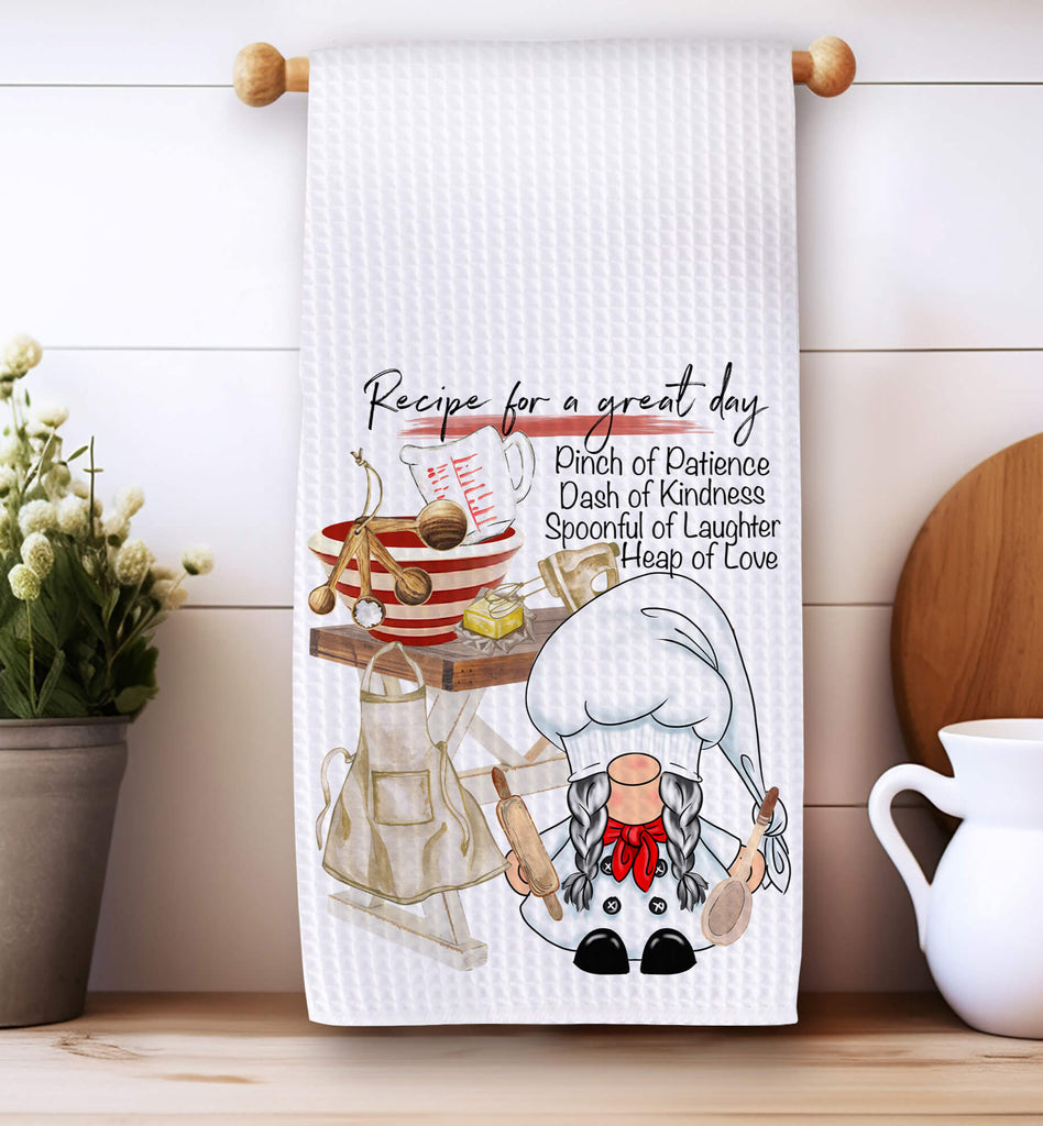 Adorable Recipe Gnome Kitchen Towel featuring a whimsical chef gnome, farmhouse baking setup, and a heartwarming 'Recipe for a Great Day' design. Perfect for baking lovers, farmhouse kitchen decor, and unique cooking gifts - Personalized Kreation