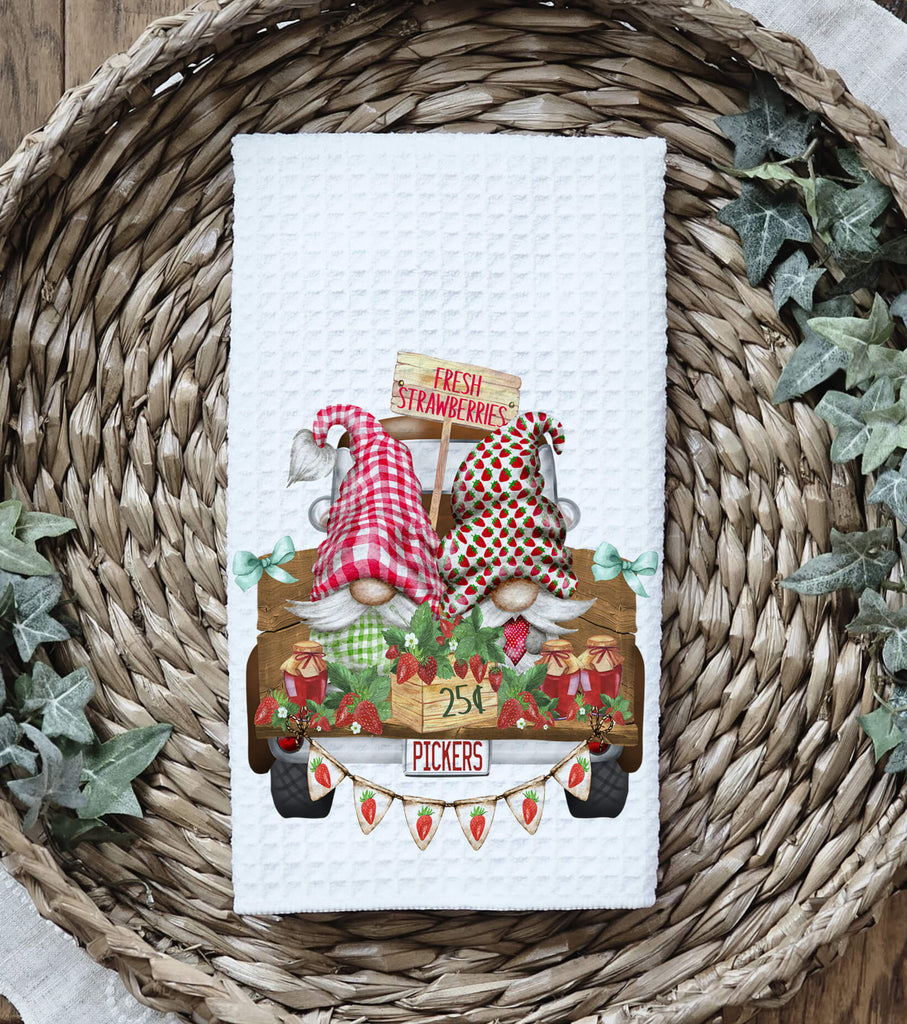 Strawberry Picker Gnome kitchen towel featuring two adorable gnomes in strawberry-themed hats with a rustic farm truck, fresh berry baskets, and farmhouse decor, perfect for country kitchen accents and summer decor - Personalized Kreation