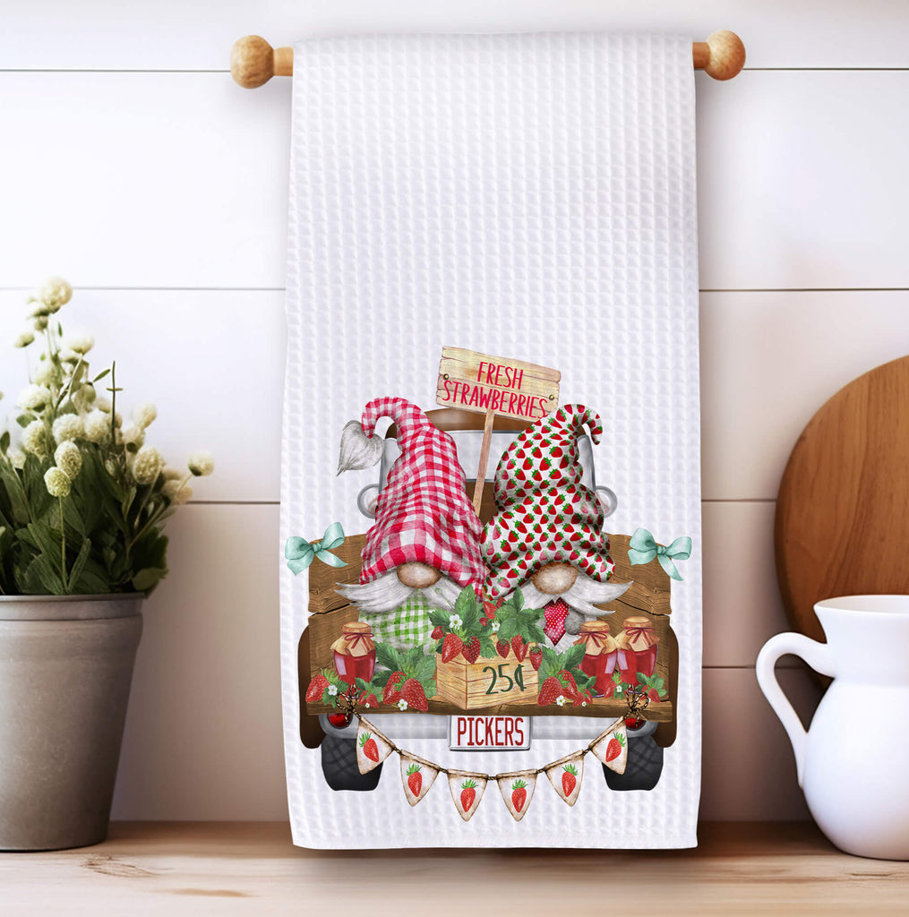 Strawberry Picker Gnome kitchen towel featuring two adorable gnomes in strawberry-themed hats with a rustic farm truck, fresh berry baskets, and farmhouse decor, perfect for country kitchen accents and summer decor - Personalized Kreation