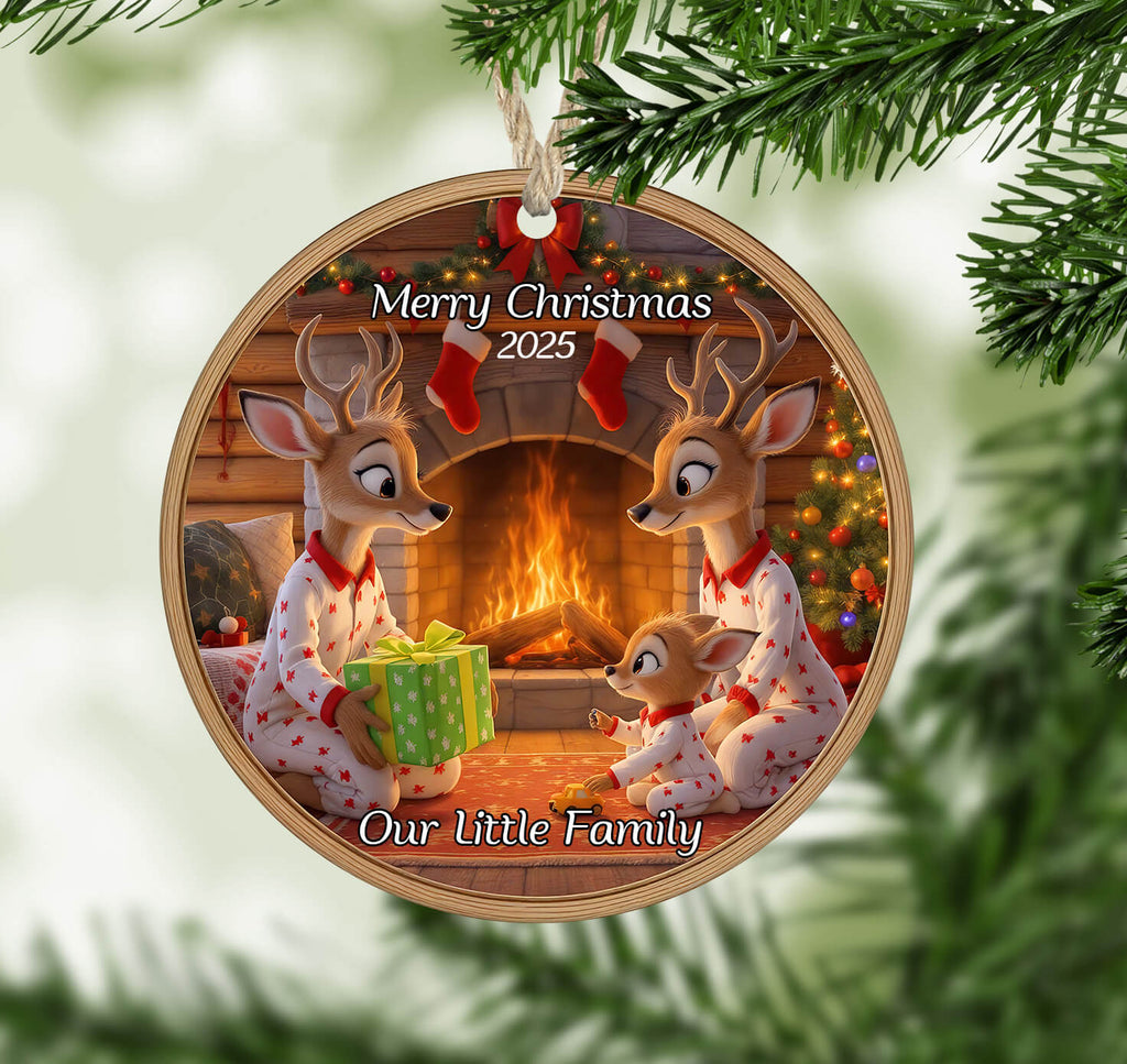Christmas ornament with reindeer family by a fireplace, 'Merry Christmas 2025' text, and 'Our Little Family' below.
