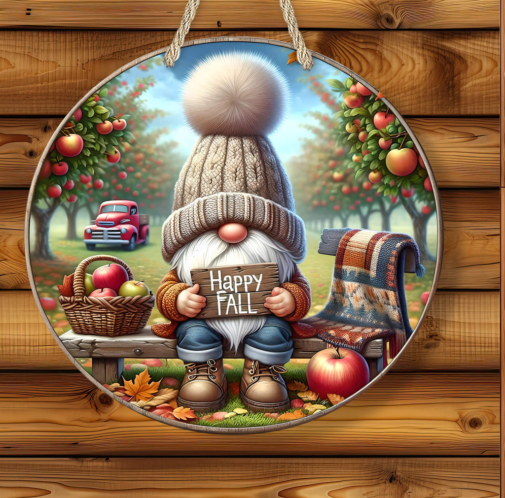 Decorative plate with a gnome holding a 'Happy Fall' sign, surrounded by autumn elements on a wooden background.