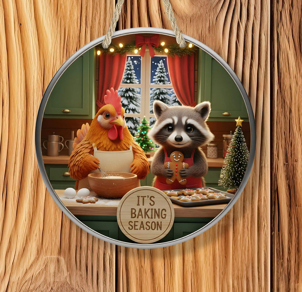 Circular ornament with a chicken and raccoon baking cookies in a kitchen, featuring 'It's Baking Season' text.