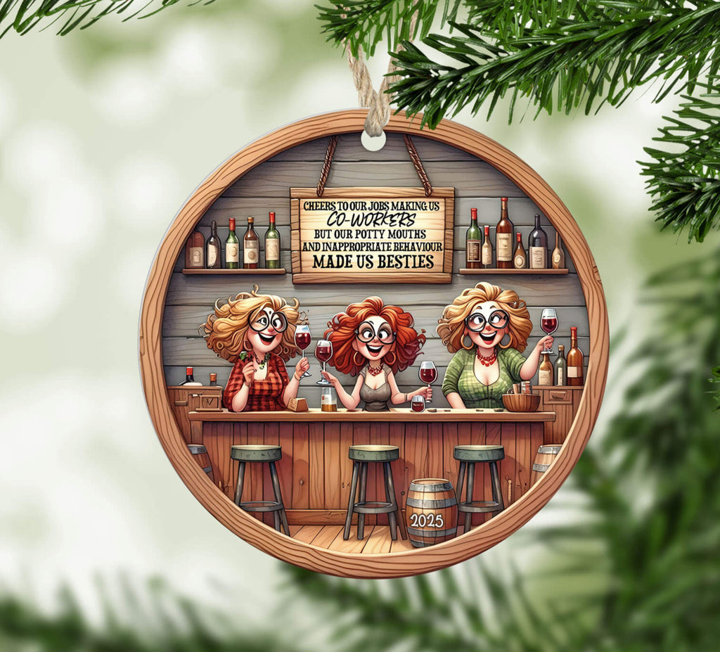 Decorative Christmas ornament with cartoon bar scene and festive text, hanging on a tree.