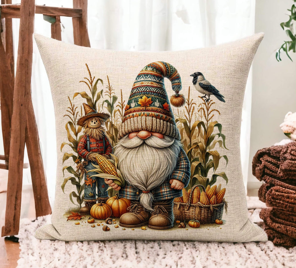 Decorative pillow with a gnome and autumn-themed design on a wooden floor.