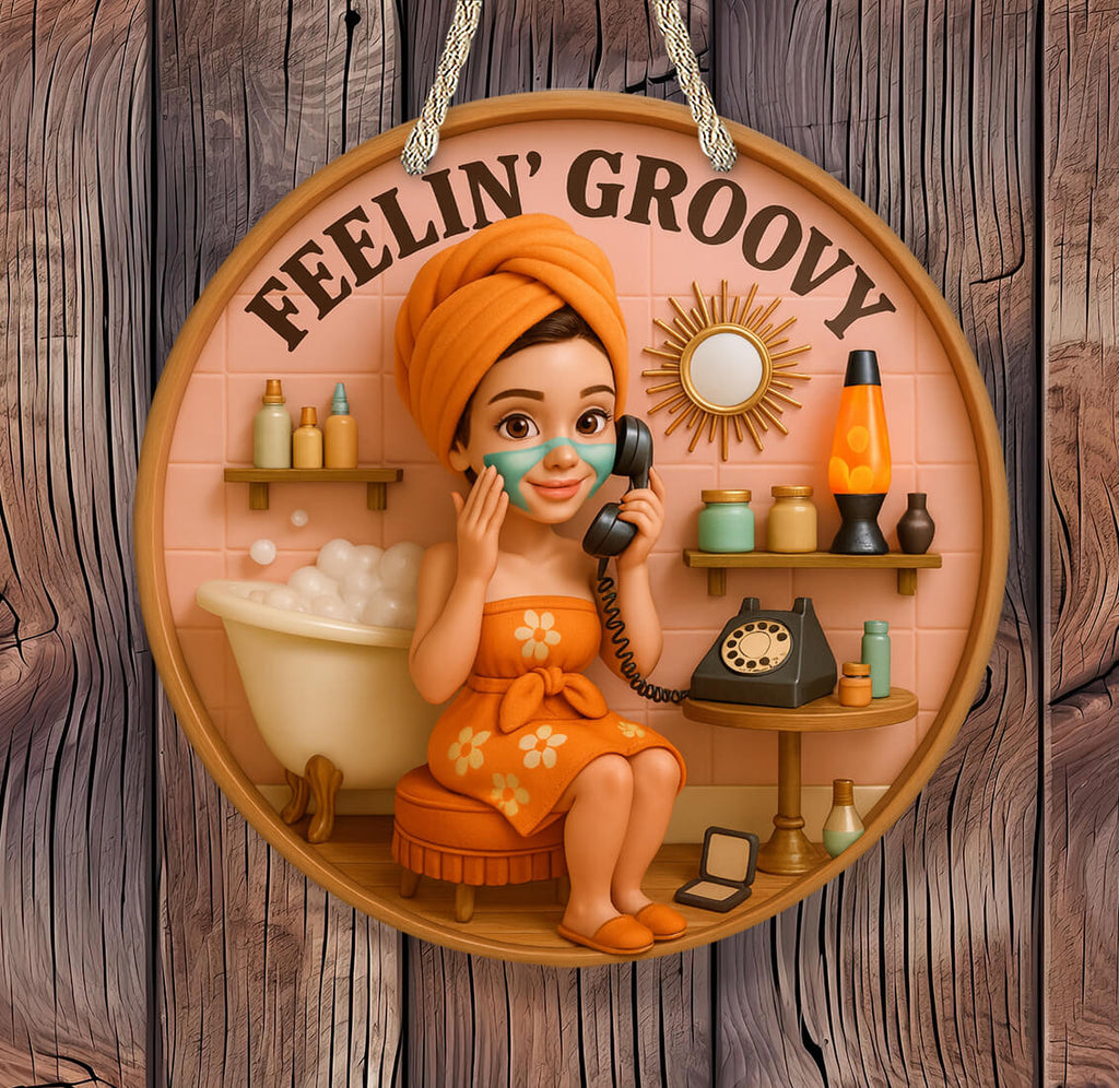 Decorative sign with a woman in an orange dress and towel, sitting in a bathroom, with 'Feelin' Groovy' text.