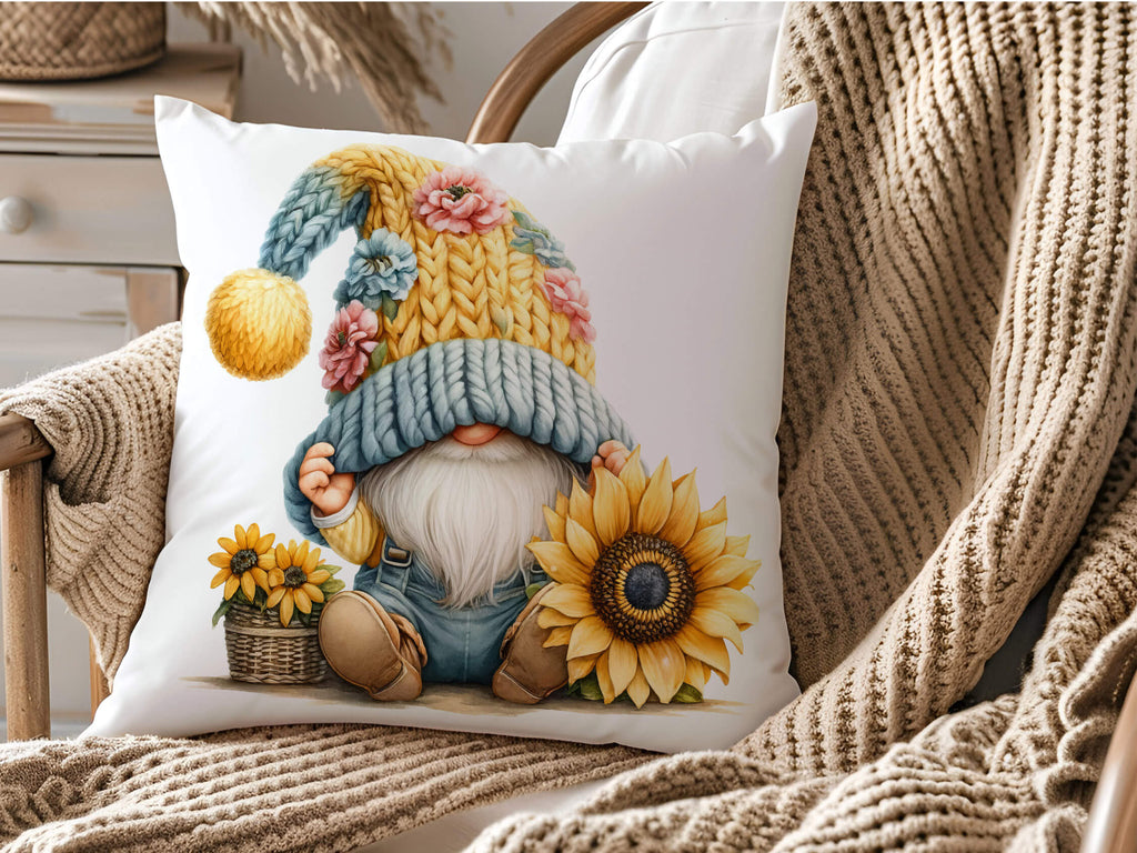 Decorative pillow with a gnome and sunflower design on a cozy chair.