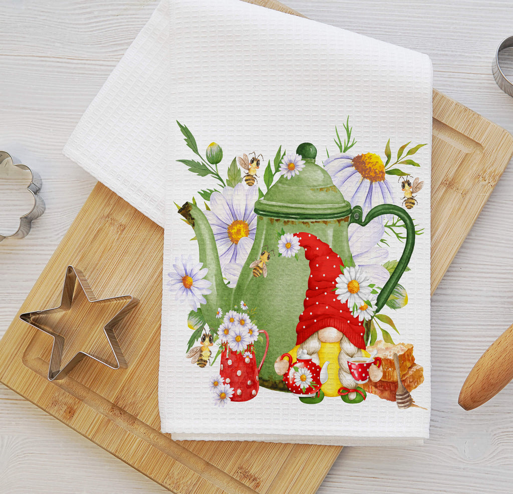 Personalized tea party kitchen towel featuring a cute gnome, floral teapot, wildflowers, and honey bees. Made from absorbent waffle weave fabric, perfect for farmhouse kitchens, tea lovers, and rustic tea-themed decor - Personalized Kreation