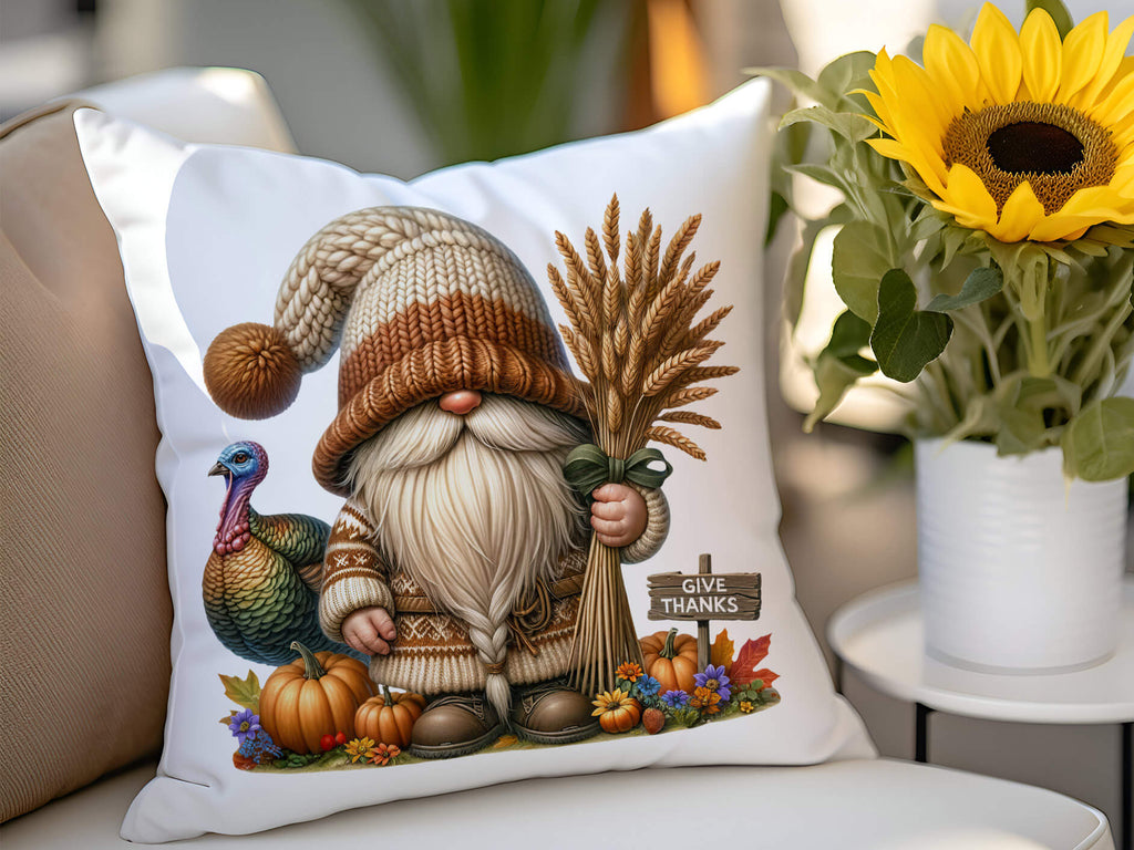 Decorative pillow with a gnome design featuring pumpkins and a turkey, placed on a couch with a sunflower in the background.