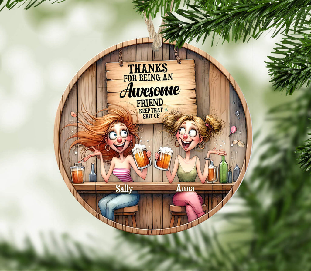 Circular wooden ornament with cartoon characters and text on a green leafy background