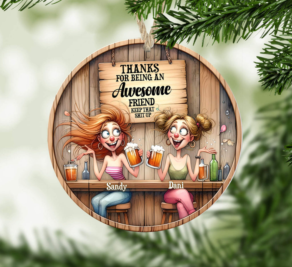 Circular wooden ornament with cartoon characters and text, surrounded by Christmas tree branches.