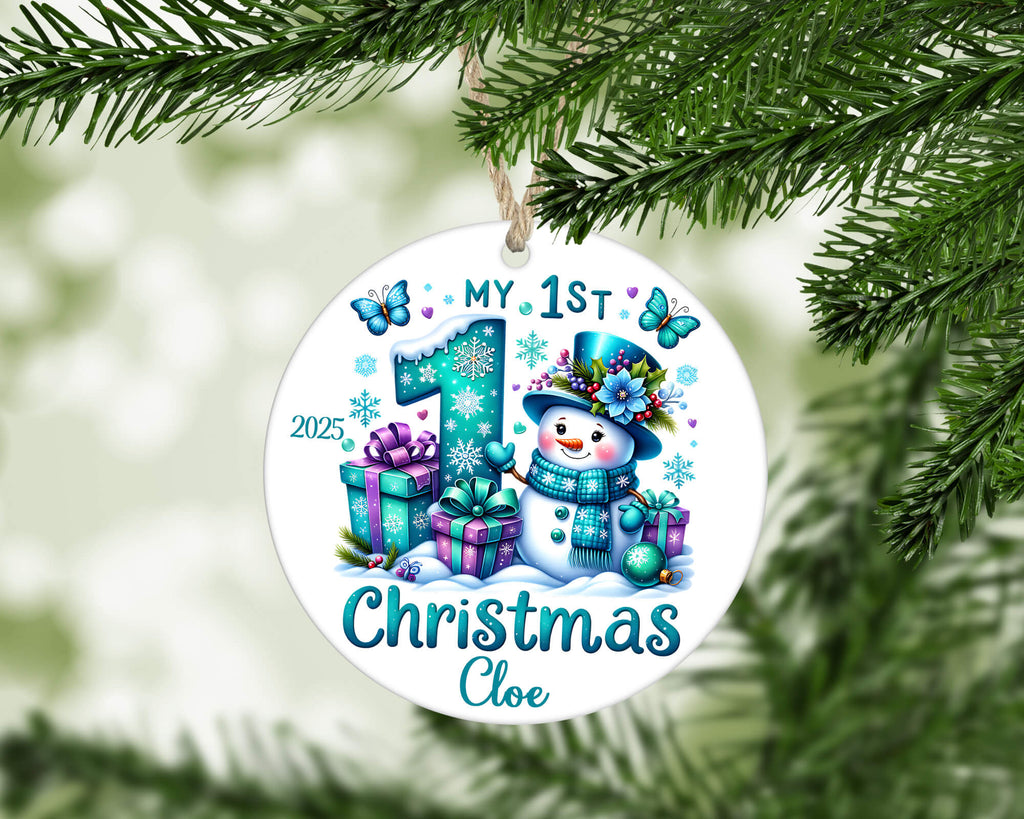 Decorative Christmas ornament with a snowman and text 'My 1st Christmas Cloe' on a green leaf background.