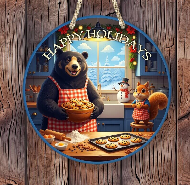 Decorative sign with a bear and squirrel baking cookies, featuring 'Happy Holidays' text.