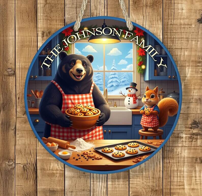 Circular sign with bear and squirrel baking cookies, featuring 'The Johnson Family' text on a wooden background.