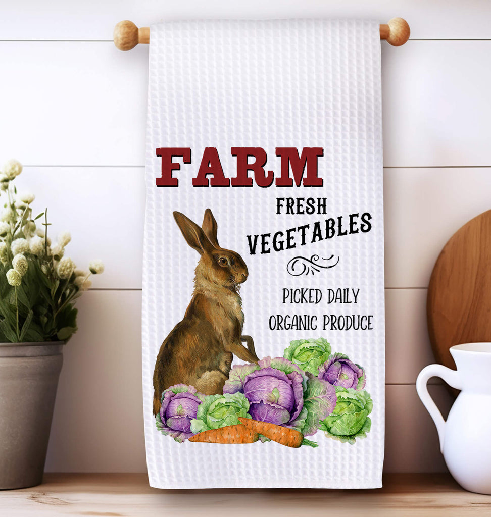 Farmhouse kitchen towel featuring a rustic bunny with fresh vegetables, including cabbage and carrots, perfect for country kitchen decor and eco-friendly home essentials - Personalized Kreation