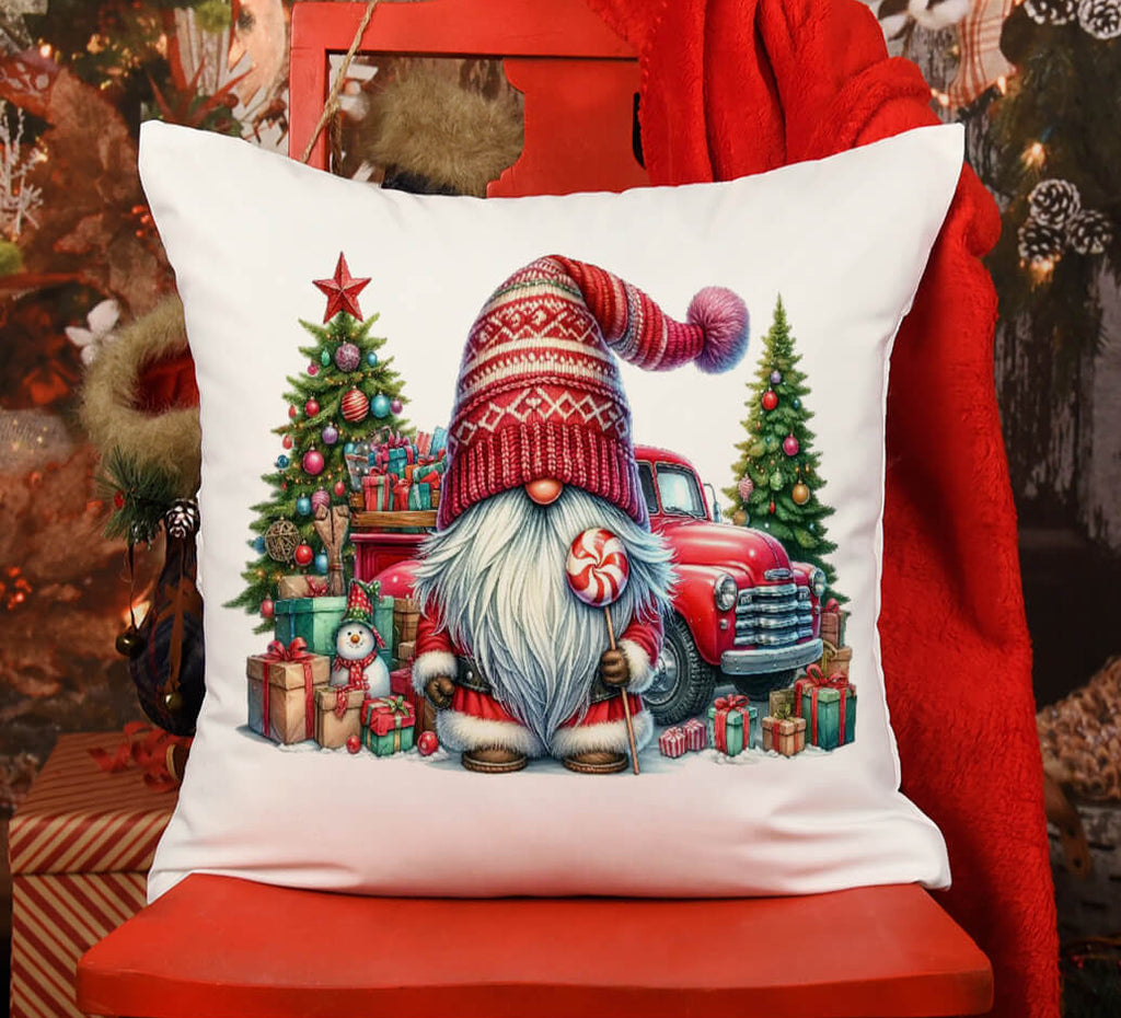Decorative pillow with a Christmas gnome design on a red chair in a festive setting.