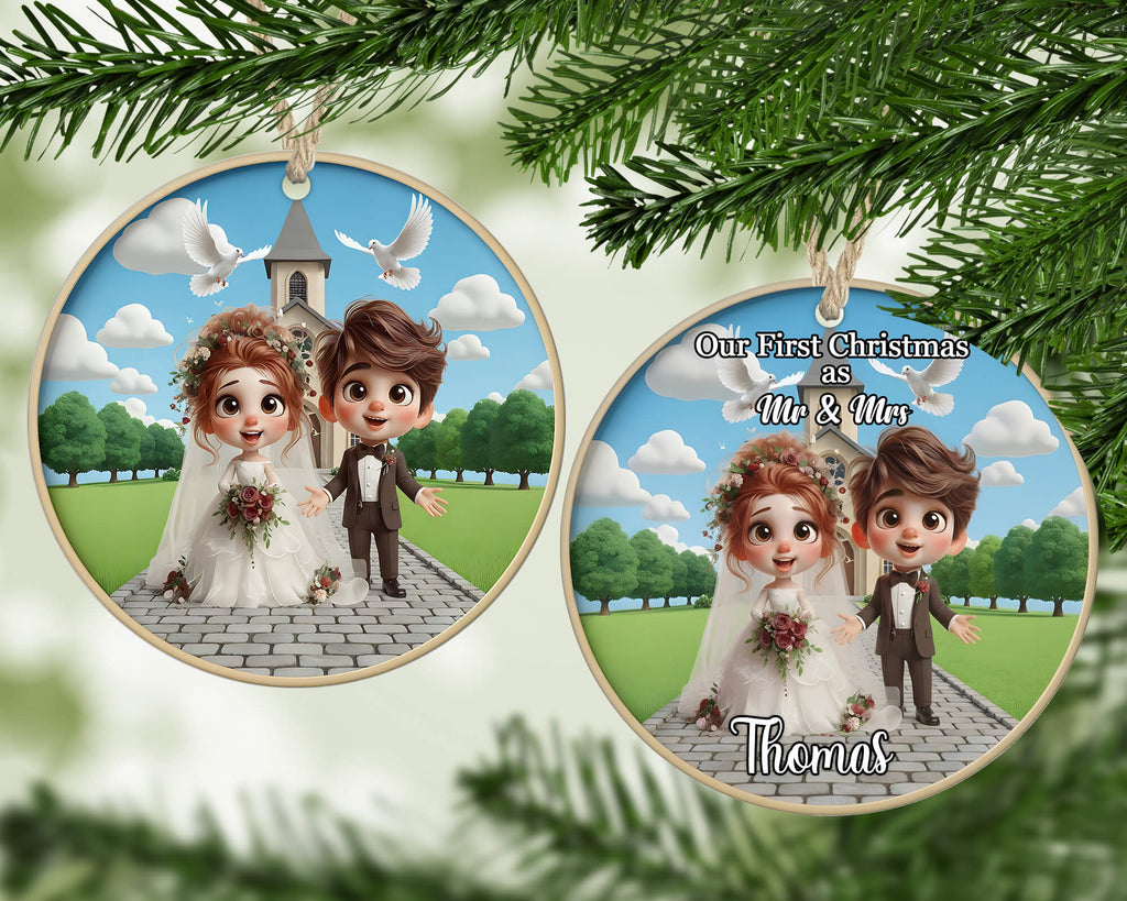 Two circular Christmas ornaments featuring cartoon bride and groom with a church and trees in the background, hanging on a tree.