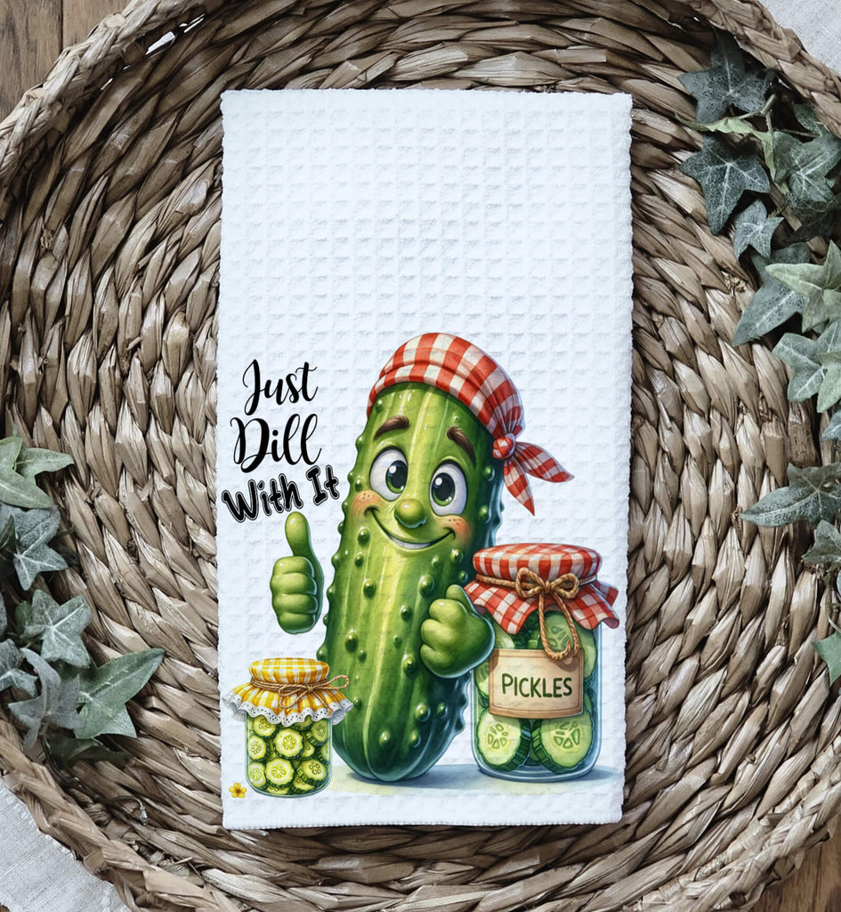 Funny pickle-themed kitchen towel featuring a smiling pickle character with the phrase "Just Dill With It," perfect for farmhouse and rustic kitchen decor - Personalized Kreation