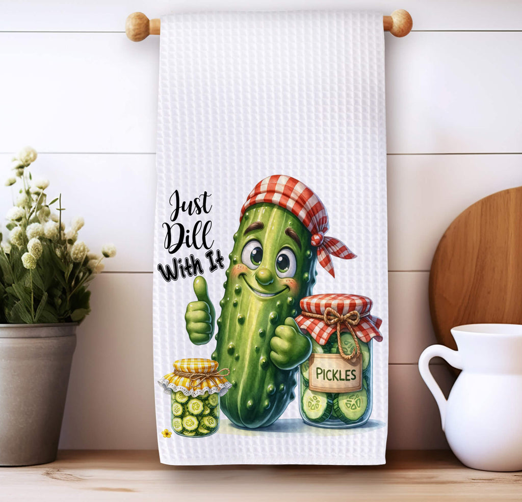 Funny pickle-themed kitchen towel featuring a smiling pickle character with the phrase "Just Dill With It," perfect for farmhouse and rustic kitchen decor - Personalized Kreation