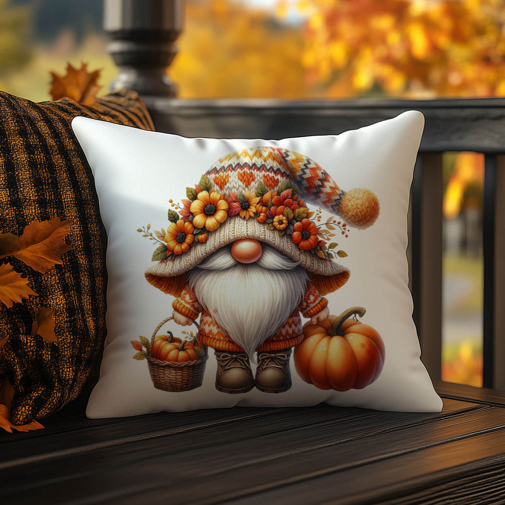 Decorative pillow with a gnome illustration on a wooden surface with autumn leaves.