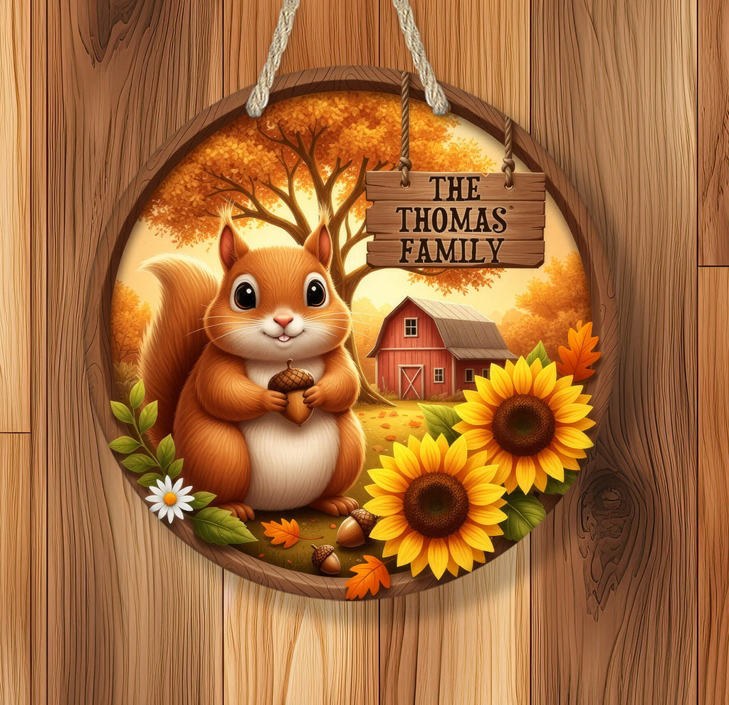 Decorative sign with a squirrel, sunflowers, and a barn, featuring 'The Thomas Family' on a wooden background.