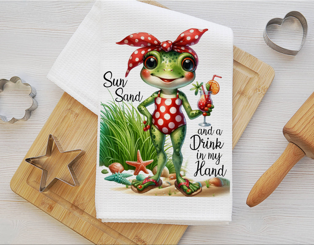 Cute frog kitchen towel set featuring two whimsical frog designs, one in a polka-dot swimsuit with a tropical drink and the other sitting on a lily pad. Perfect for farmhouse kitchens, summer décor, and cottagecore enthusiasts. Soft, absorbent, and stylish dish towels - Personalized Kreation