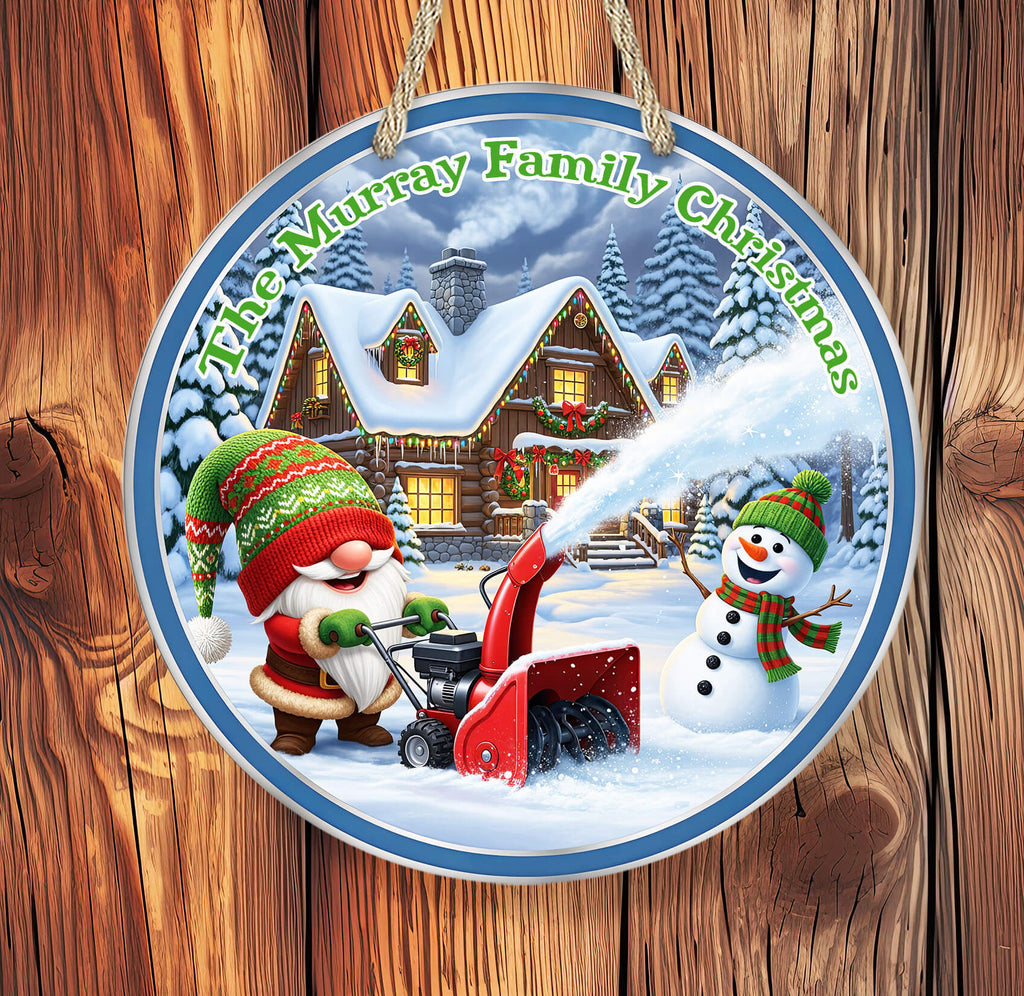 Decorative Christmas ornament with Santa and snowman in front of a snowy cabin, featuring 'The Murray Family Christmas' text.