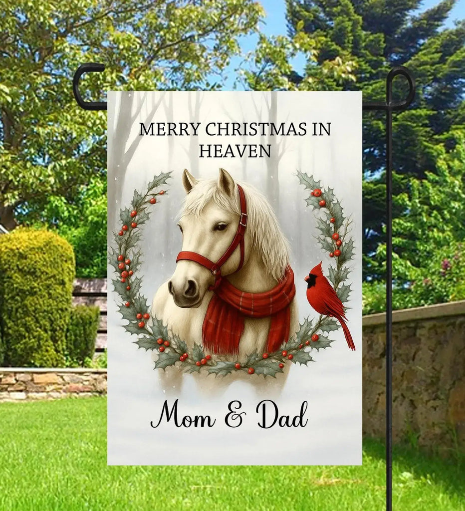 Garden flag with a horse, cardinal, and wreath design, featuring 'Merry Christmas in Heaven Mom & Dad' text.