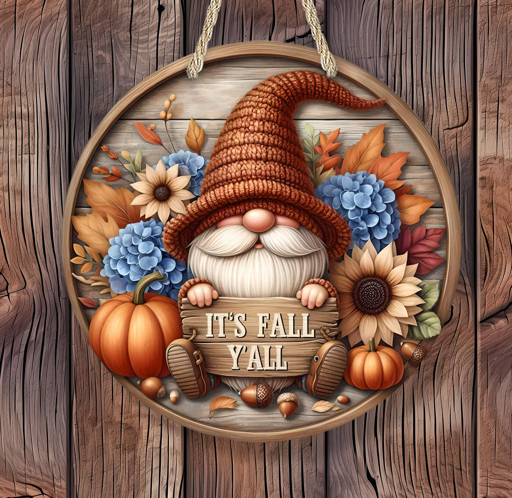 Decorative sign with a gnome, pumpkins, and fall-themed elements on a wooden background