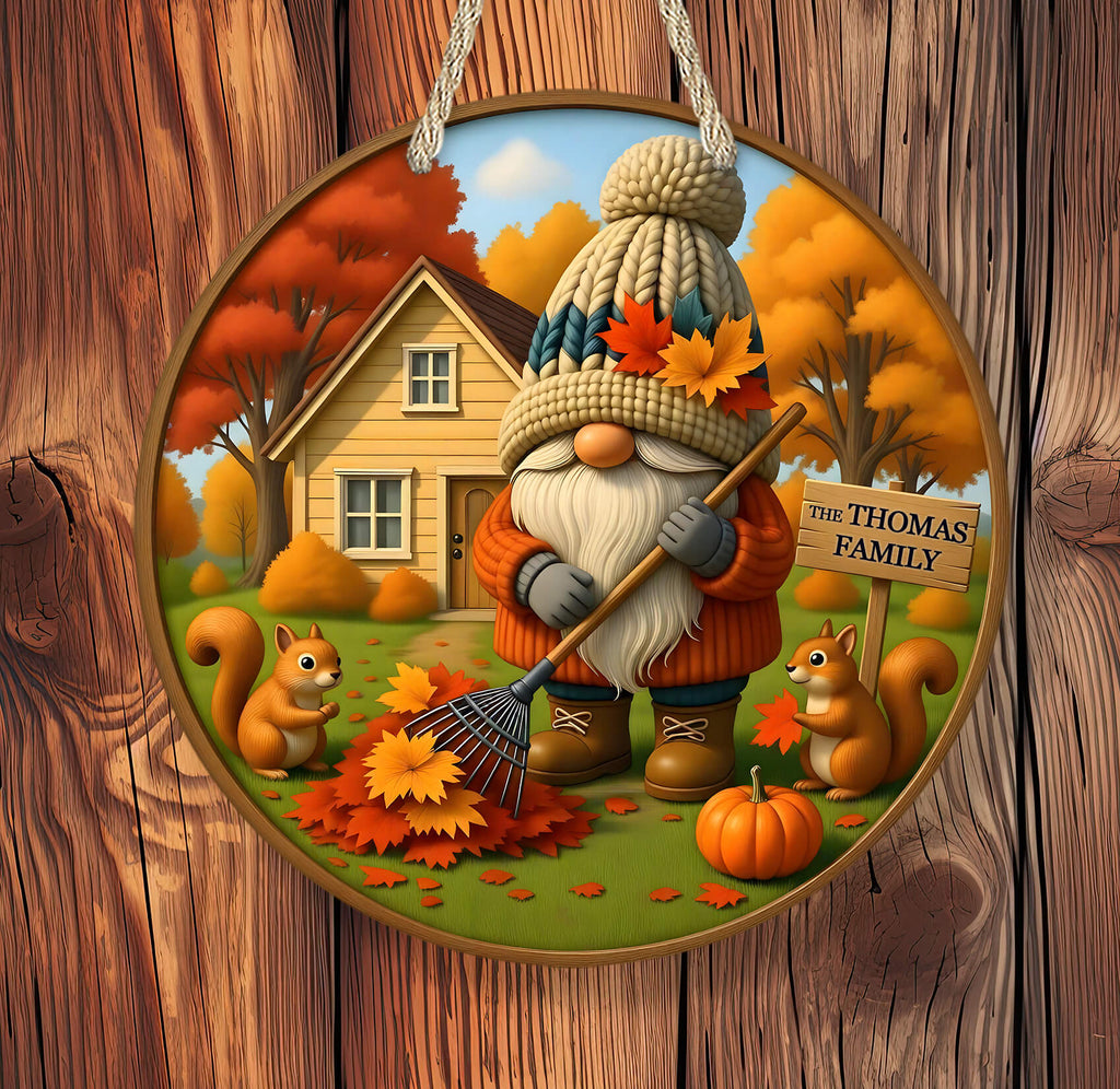 Decorative autumn-themed ornament with a gnome, pumpkins, and squirrels on a wooden background.