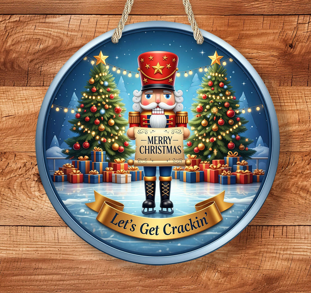 Decorative Christmas ornament with a nutcracker holding a 'Merry Christmas' sign, surrounded by trees and presents on a wooden background.
