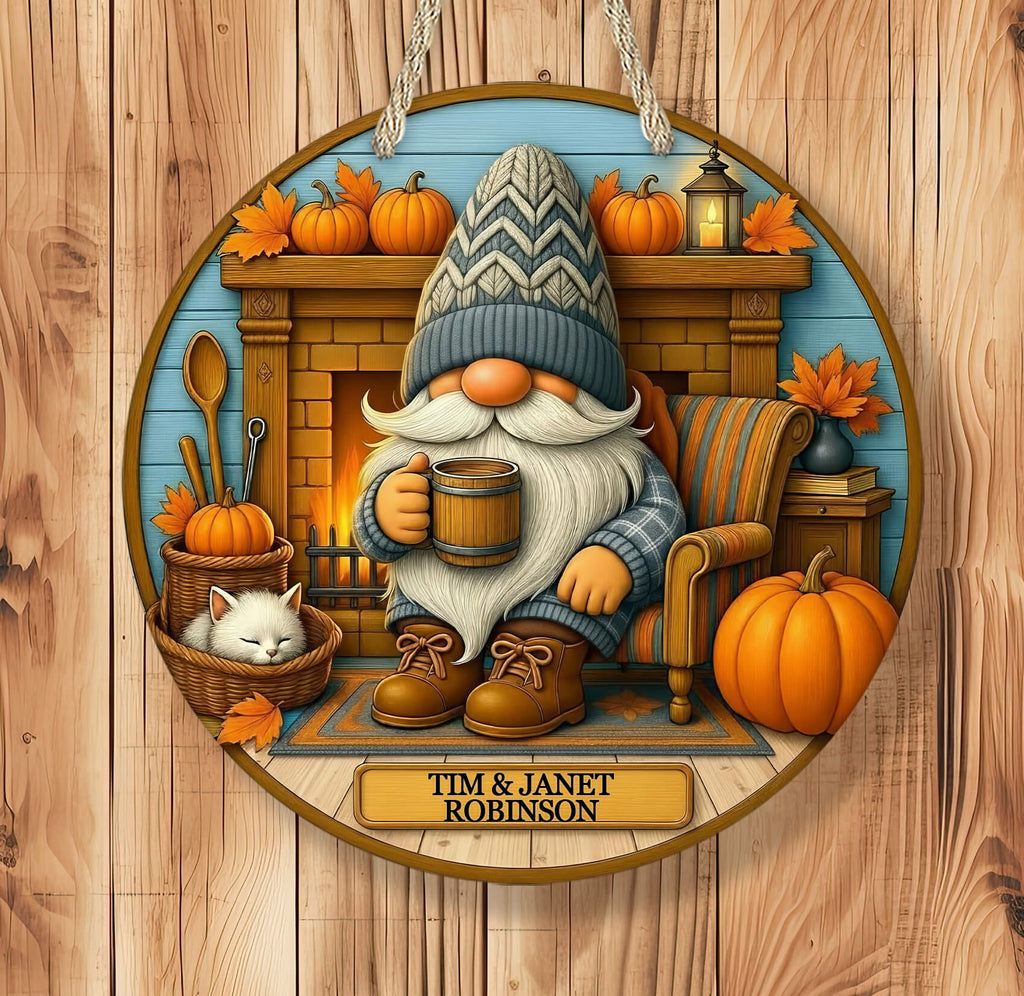 Decorative wall art with a gnome, cat, and pumpkins in a cozy room setting.