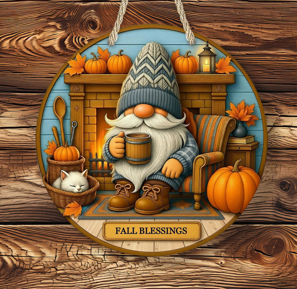Gnome with a mug, cat, and pumpkins in a cozy fireplace setting with 'Fall Blessings' text.