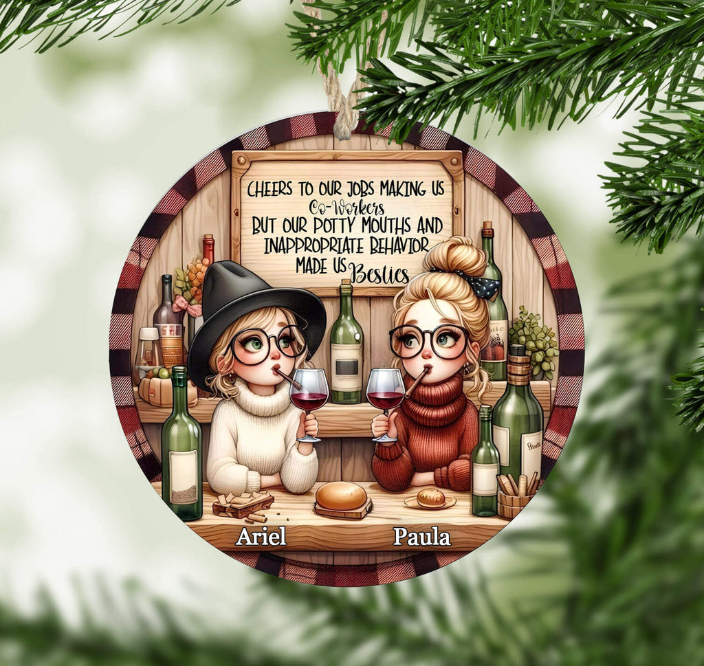 Circular ornament with cartoon characters at a table with wine bottles and glasses, surrounded by Christmas tree branches.