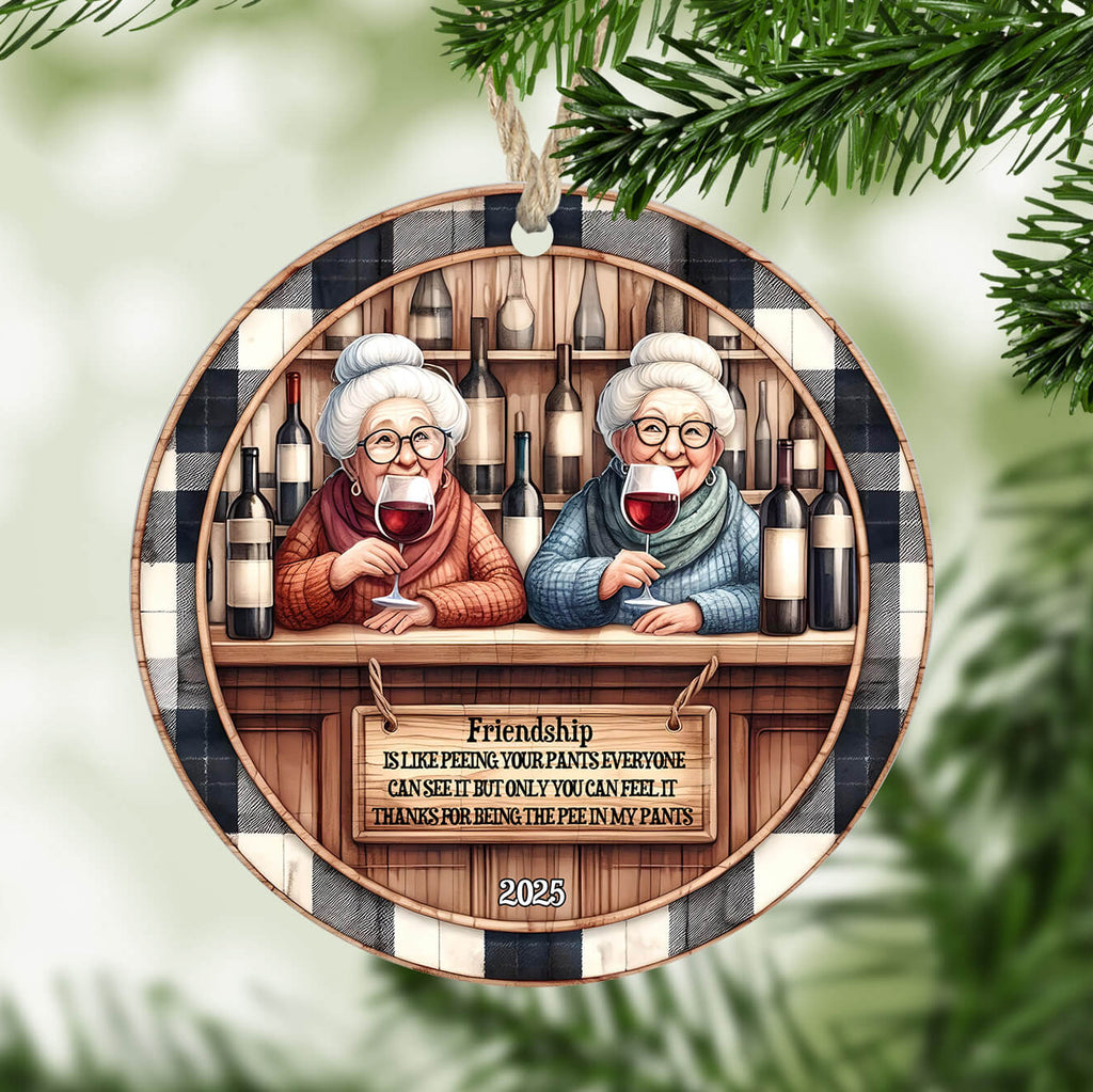 Decorative ornament with two elderly women at a bar, surrounded by wine bottles, with a checkered pattern and text.