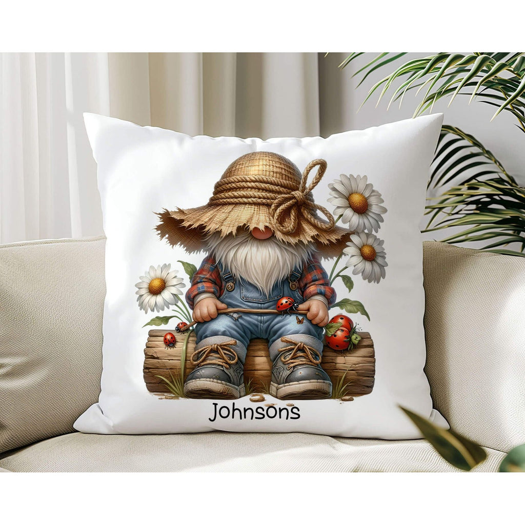 A farmhouse-style gnome pillow featuring a cute gnome with a rustic straw hat, sitting on a log, surrounded by daisies and ladybugs, with the text "Nature’s Little Wonders". The 18x18-inch pillow is available in white canvas or beige linen, with a hidden zipper closure, perfect for cottagecore, farmhouse, and nature-inspired home decor - Personalized Kreation