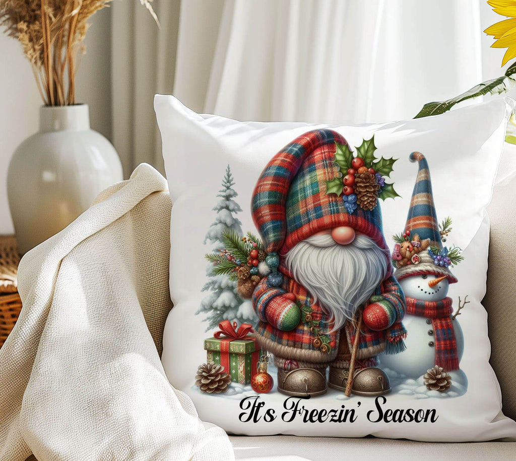 Decorative pillow with Christmas-themed design featuring a gnome and snowman on a couch.