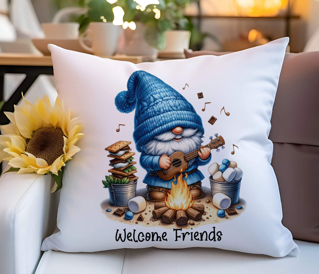 A personalized camping pillow featuring a cute gnome playing a guitar by a campfire, surrounded by marshmallows, chocolate, and s’mores ingredients. Available in 18x18 inches, white canvas or beige linen, with a hidden zipper closure. Perfect for camping lovers, rustic home decor, and cozy cabin retreats - Personalized Kreation