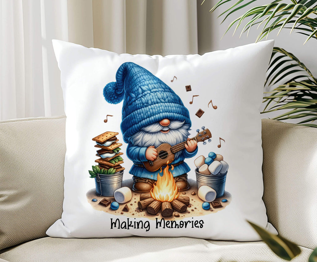 A personalized camping pillow featuring a cute gnome playing a guitar by a campfire, surrounded by marshmallows, chocolate, and s’mores ingredients. Available in 18x18 inches, white canvas or beige linen, with a hidden zipper closure. Perfect for camping lovers, rustic home decor, and cozy cabin retreats - Personalized Kreation