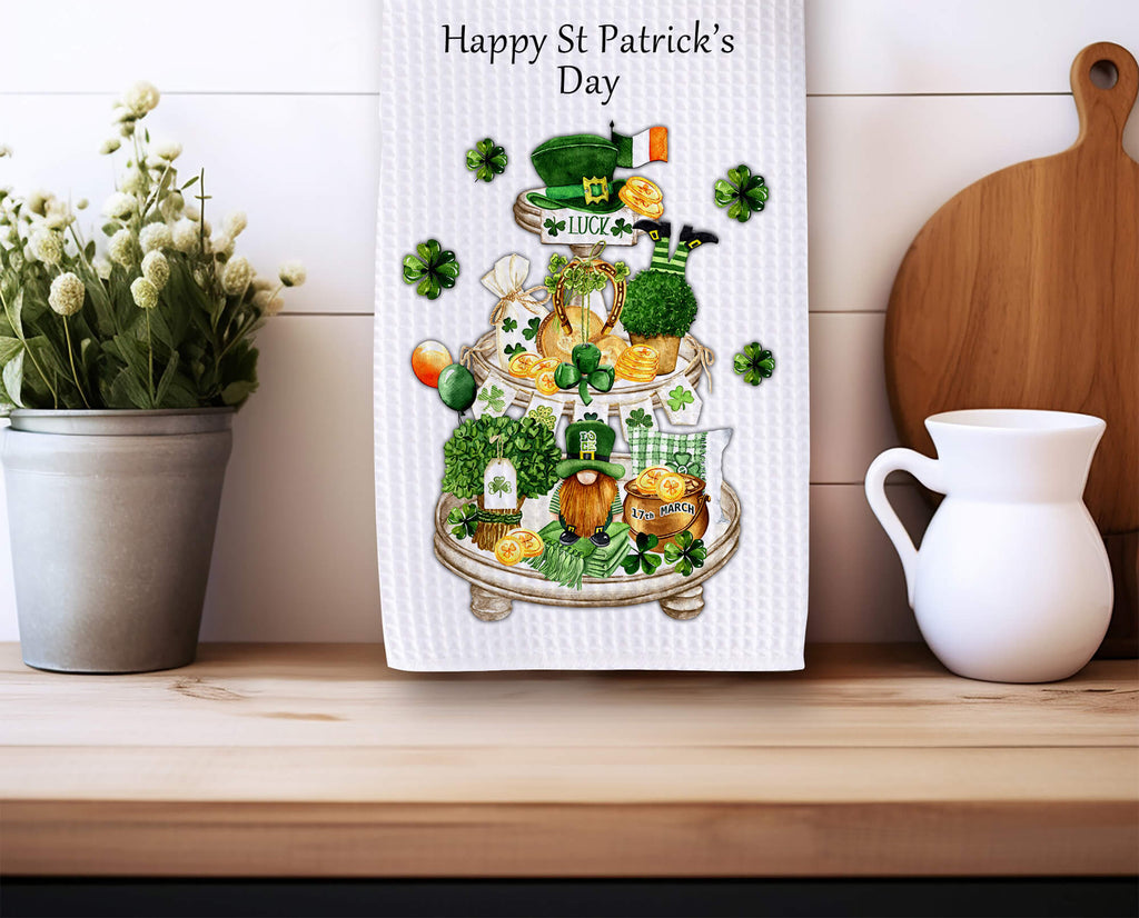 St. Patrick’s Day kitchen towel with tiered tray design featuring shamrocks, leprechaun, gold coins, and festive Irish decor. Perfect farmhouse kitchen decor or lucky holiday gift. Personalized St. Patrick’s Day tea towel for home and celebrations