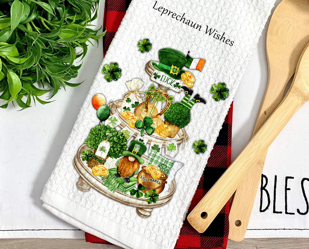 St. Patrick’s Day kitchen towel with tiered tray design featuring shamrocks, leprechaun, gold coins, and festive Irish decor. Perfect farmhouse kitchen decor or lucky holiday gift. Personalized St. Patrick’s Day tea towel for home and celebrations