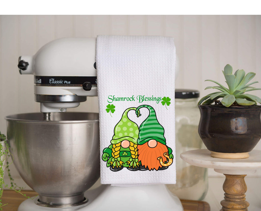 St. Patrick’s Day kitchen towel featuring a green Irish truck with shamrocks, gold coins, and festive decorations. Perfect holiday dish towel for farmhouse kitchens, St. Paddy’s decor, or a lucky housewarming gift. Soft, absorbent, and machine washable