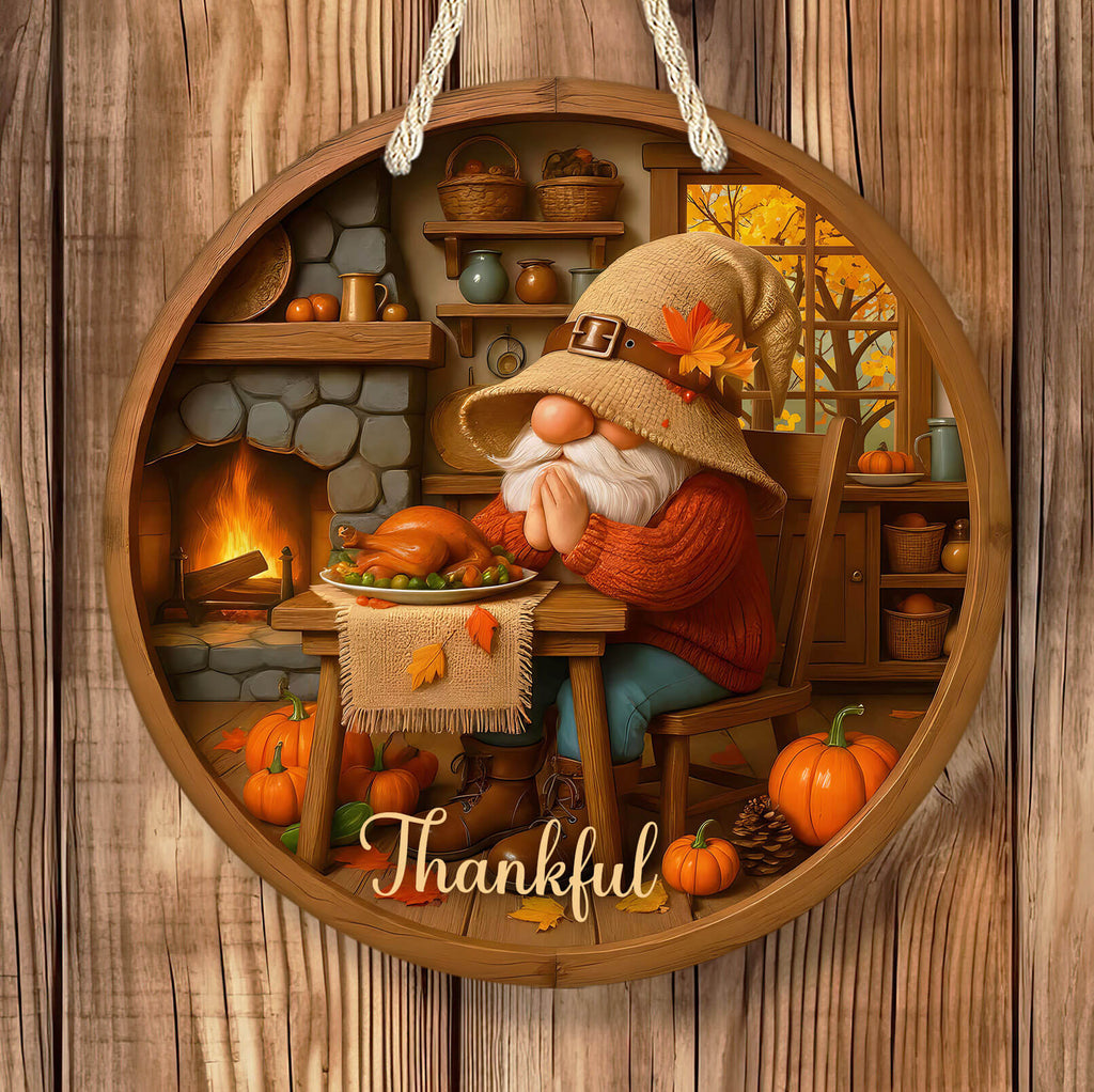 Decorative scene with a gnome, pumpkin, and fireplace on a wooden background