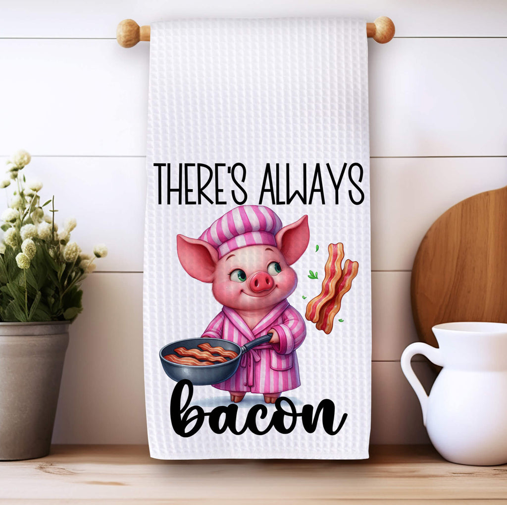 Charming kitchen towel featuring an adorable pig chef in pink pajamas flipping bacon in a frying pan, with the phrase Theres Always Bacon Perfect for farmhouse kitchens
rustic decor and bacon lovers - Personalized Kreation