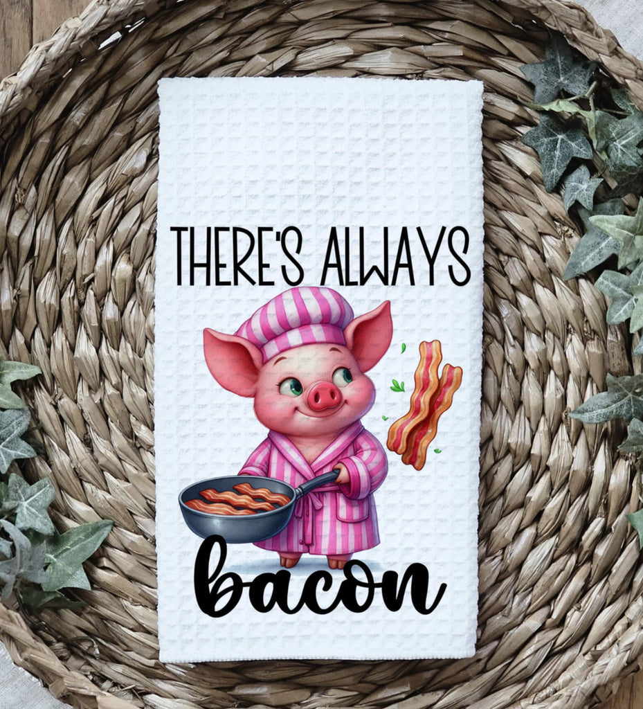 Charming kitchen towel featuring an adorable pig chef in pink pajamas flipping bacon in a frying pan with the phrase Theres Always Bacon Perfect for farmhouse kitchens rustic decor, and bacon lovers - Personalized Kreation