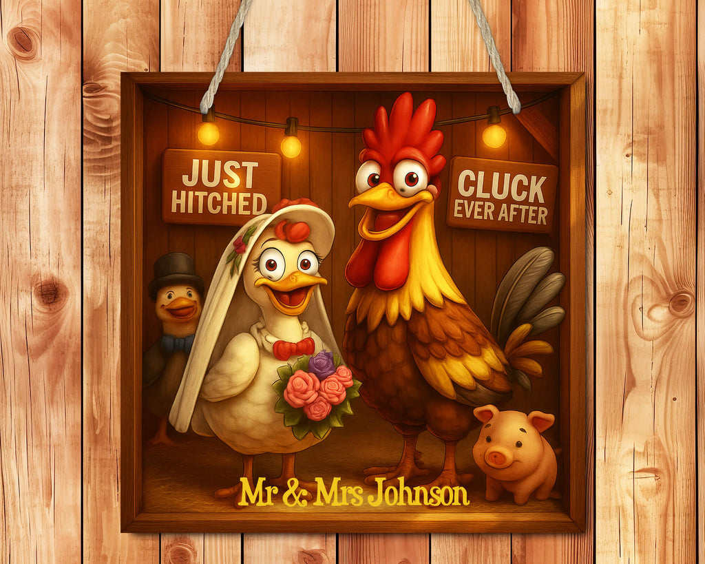 Decorative sign with cartoon chicken and rooster couple on a wooden background